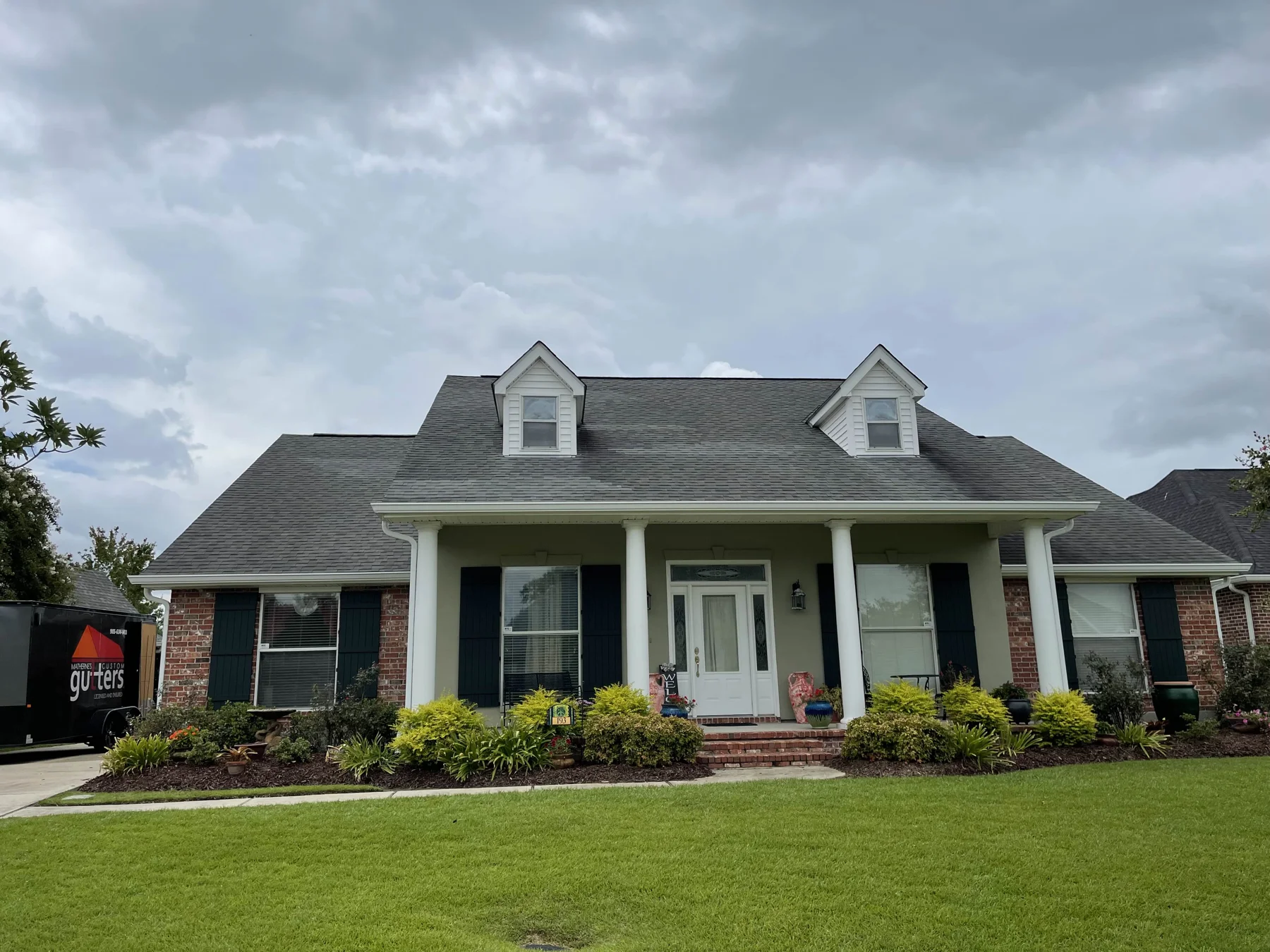 Seamless gutters on a completed brick home
