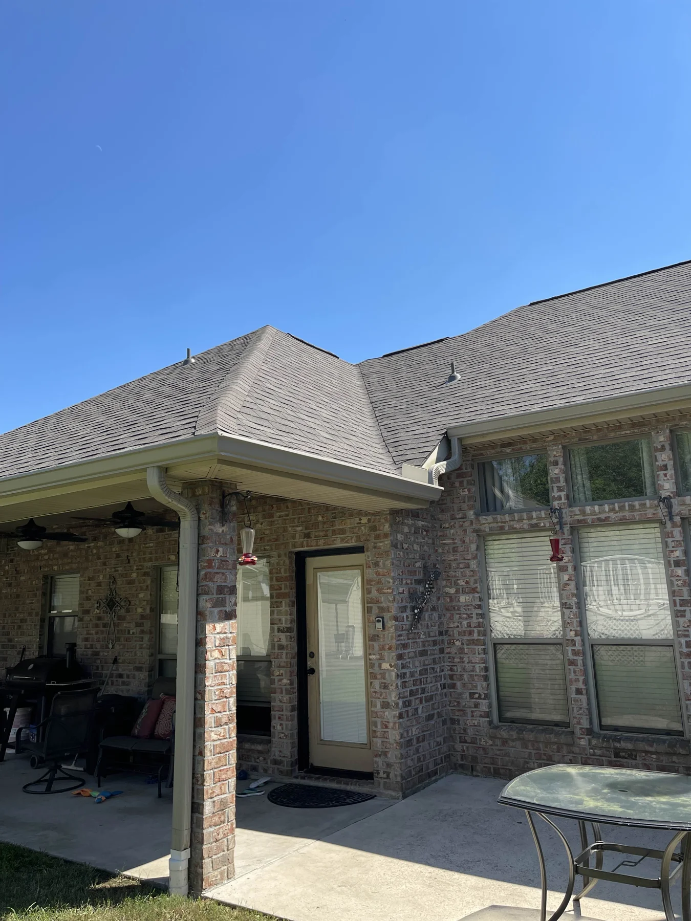 Gutters along a covered entry