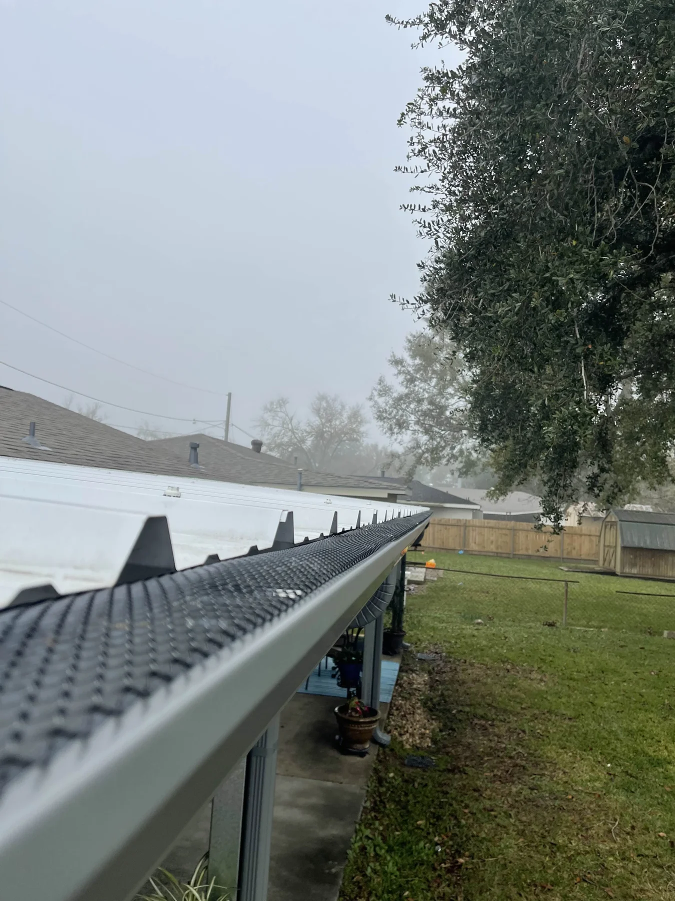Long gutter run beside a metal roof