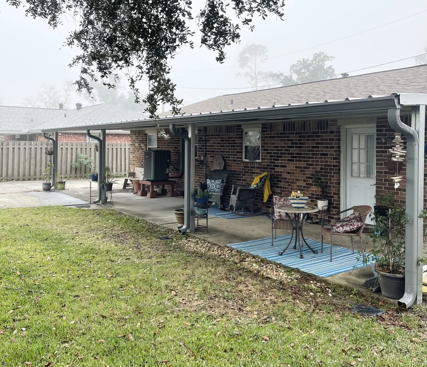 Gutters along a covered brick patio