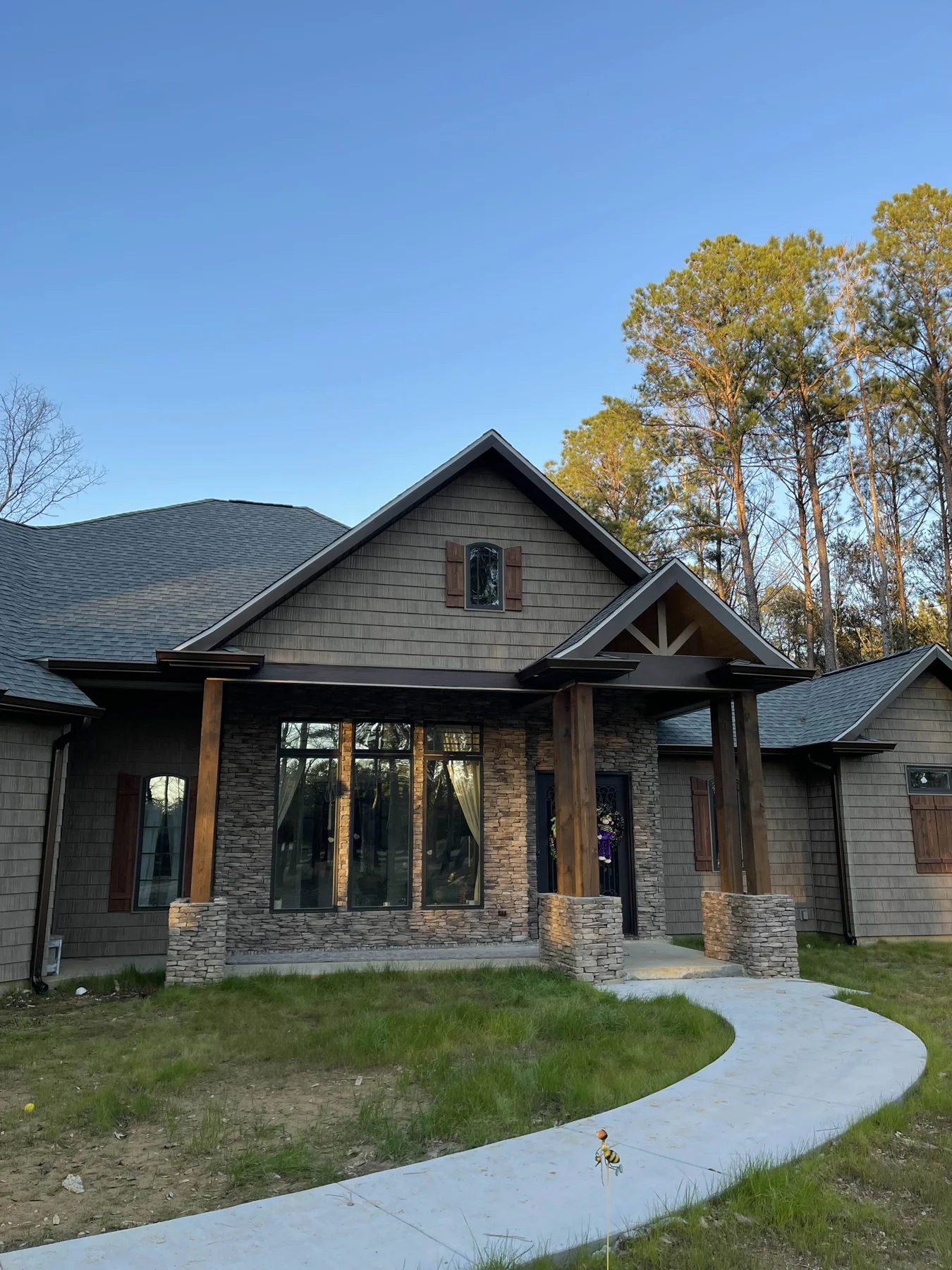 Gutter installation on a brick entryway