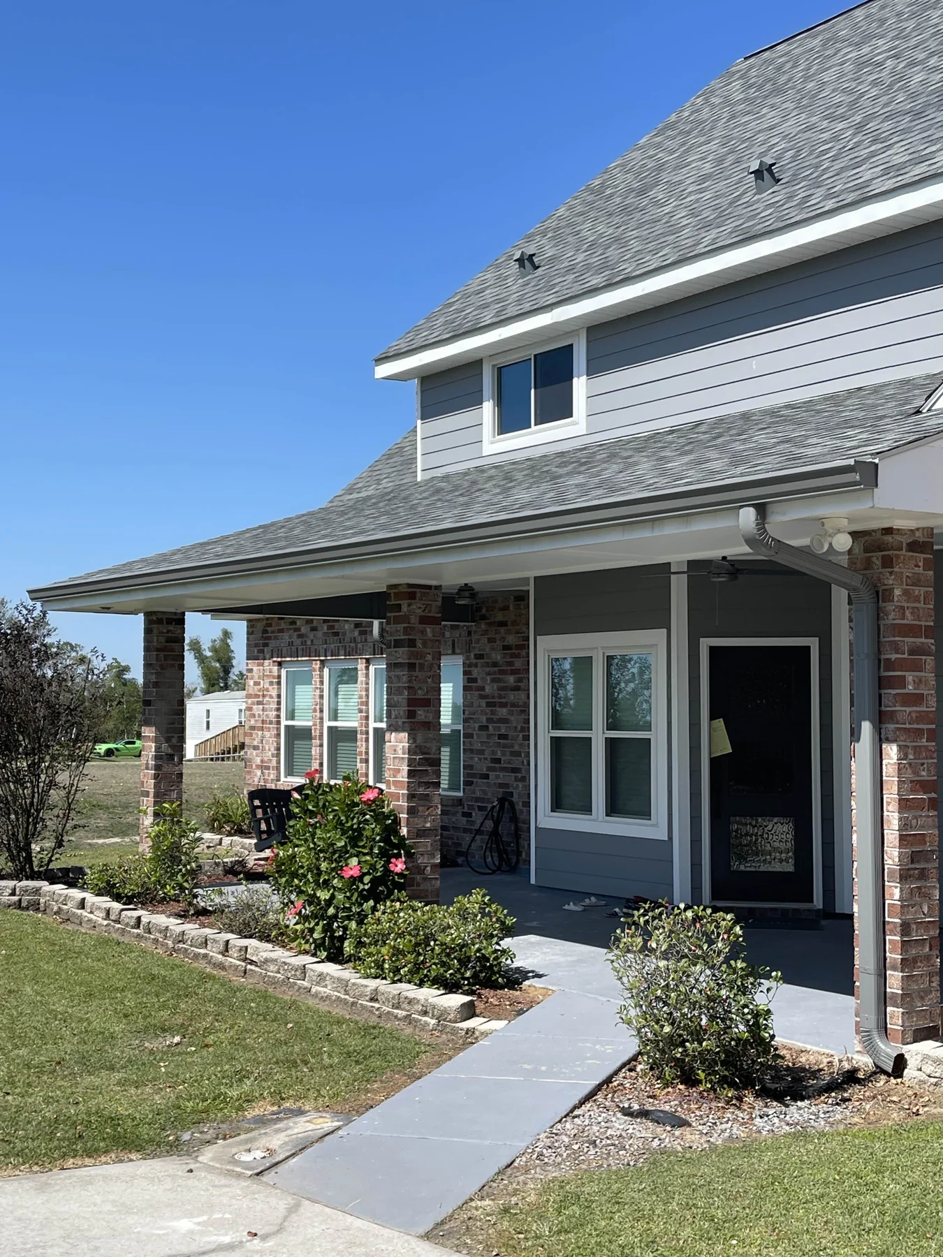 Gutters along a two-story brick home