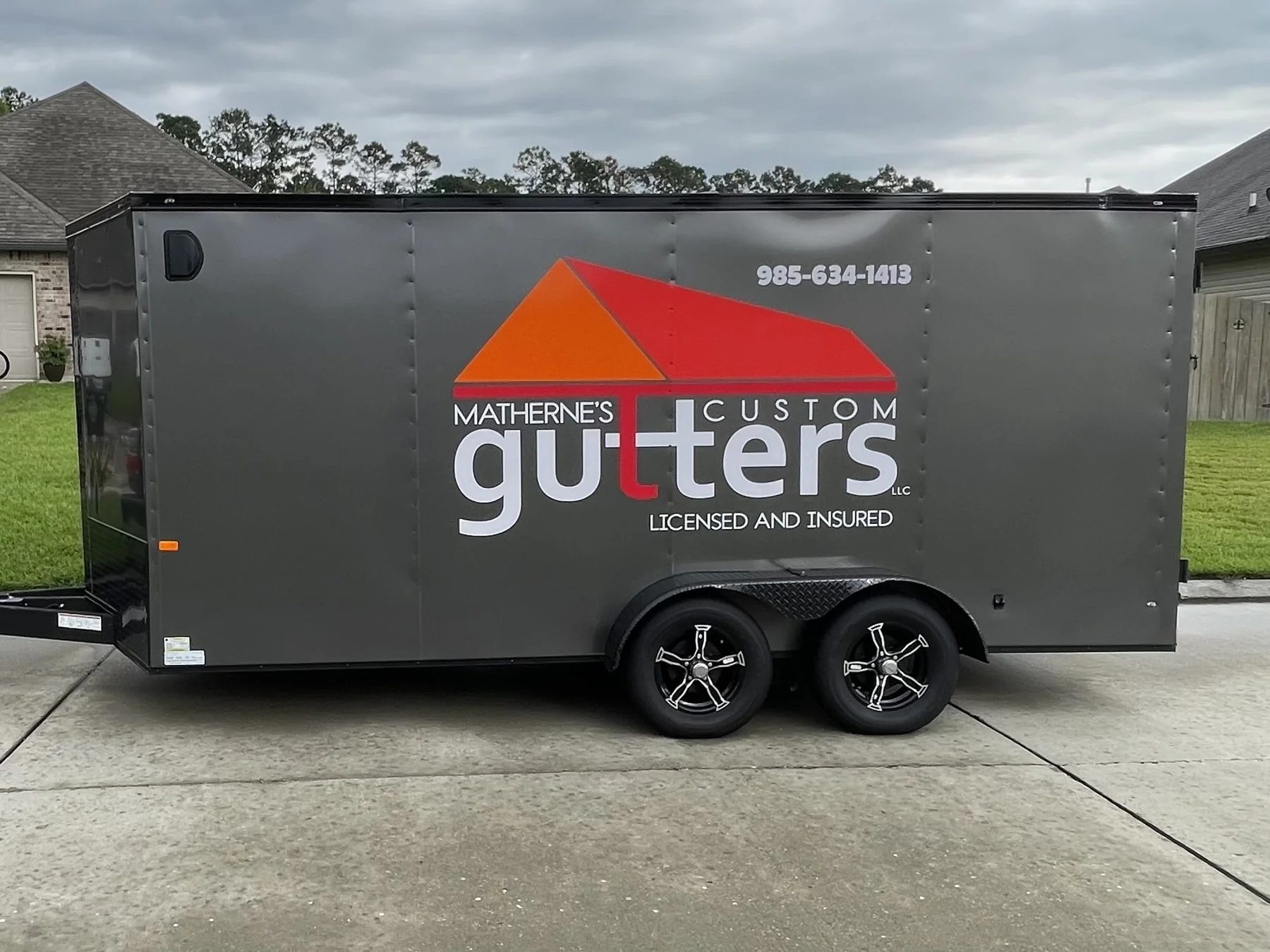 Matherne’s Custom Gutters branded work trailer
